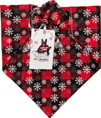 a black and red plaid dog bandana with a tag